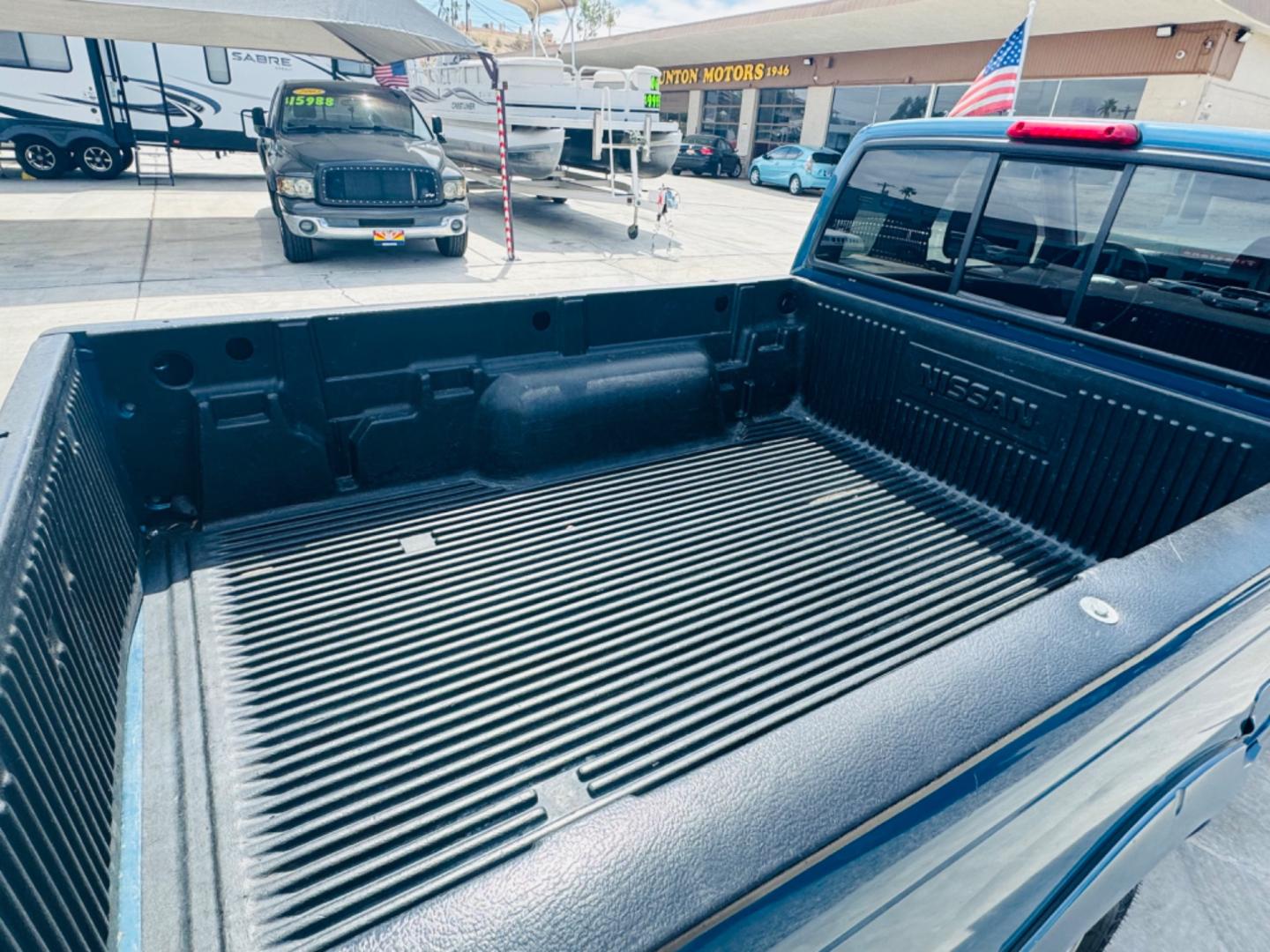 2001 Blue Nissan Frontier (1N6DD26S41C) , located at 2190 Hwy 95, Bullhead City, AZ, 86442, (928) 704-0060, 0.000000, 0.000000 - 2001 Nissan frontier xe king cab. 4 cylinder. 142k miles. Manual . Ice cold ac. Lots of extras done to truck . New tires new radiator. Fully serviced. New clutch, new brakes, pads. Runs and drives great. Financing available. In house financing .buy here pay here - Photo#7